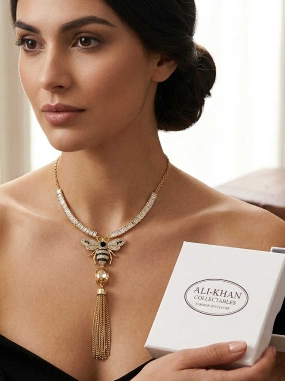 Ali Khan black bumble bee gold chain necklace and Crystal clear stones